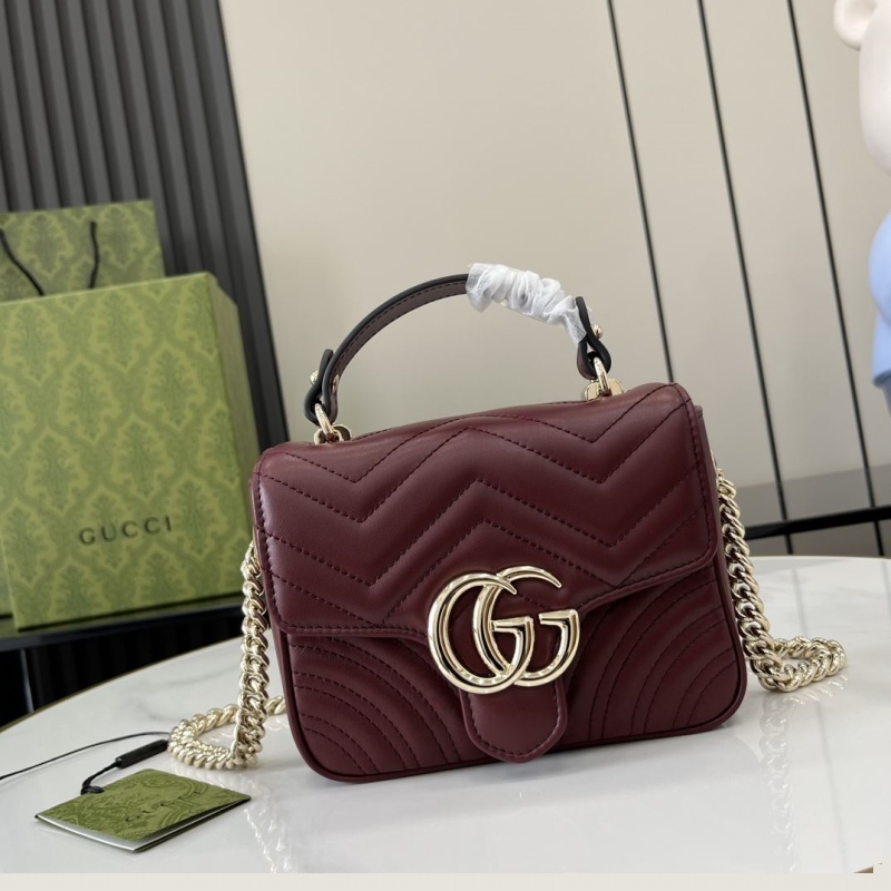 G*u*i top handle bags